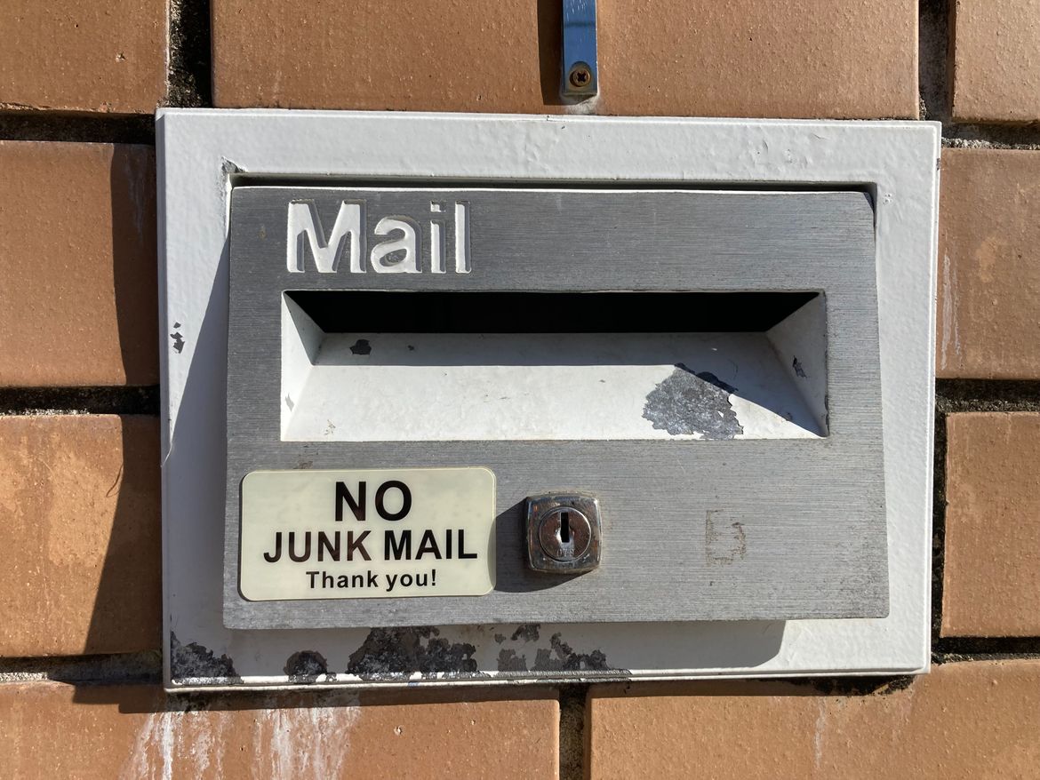 Welcoming Brick Mailbox with Sign