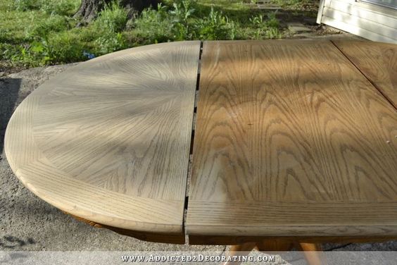Cerused oval dining table with wooden top and base