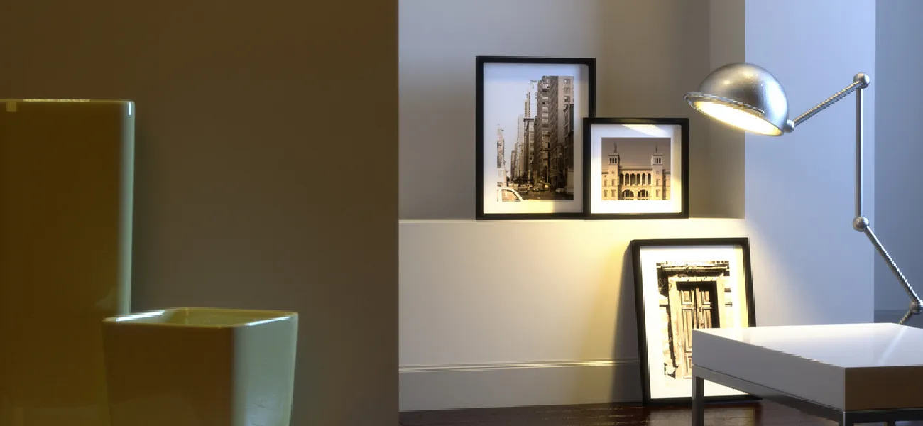 A well-lit room with a lamp, a vase, and a framed picture. The image also includes a Light Reflectance Value Chart