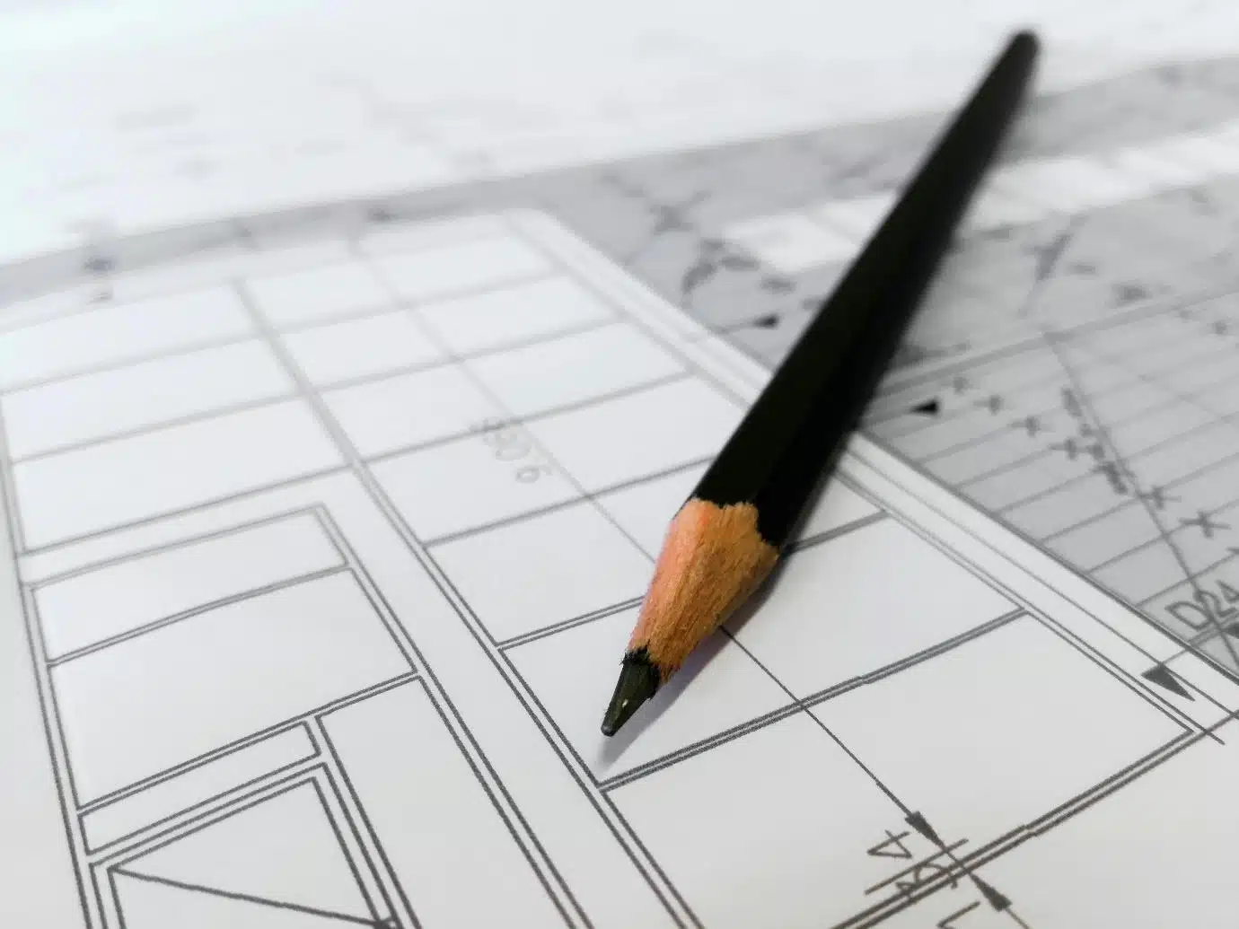 A pencil on a paper AI-generated content may be incorrect.
