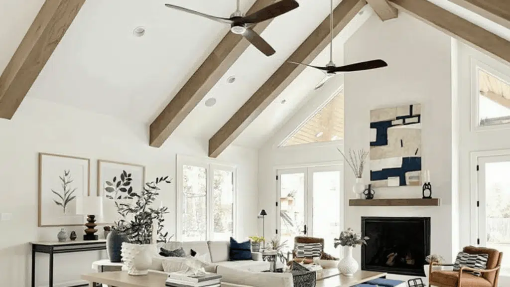 vaulted ceiling with ceiling fans