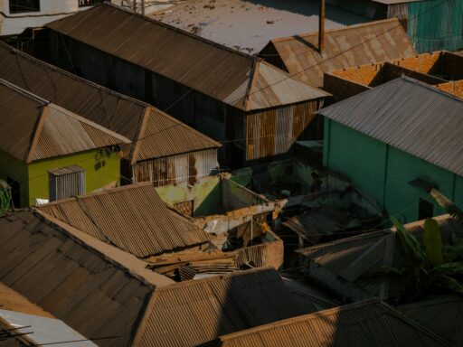 https://unsplash.com/photos/roofs-of-weathered-buildings-in-a-densely-populated-area-IgLJNJo1rmc