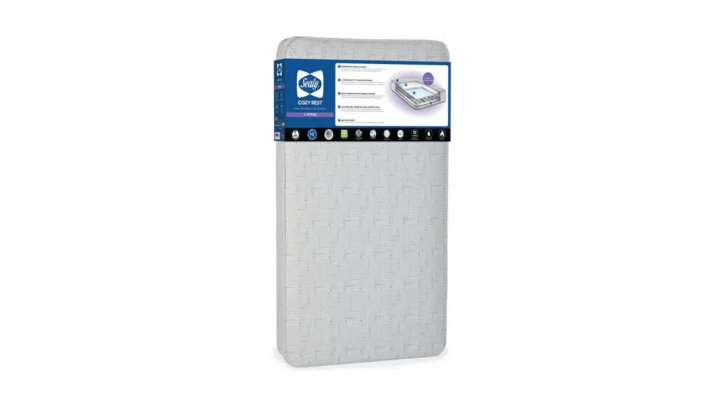 baby crib mattress with gray cover and sealy cozy rest packaging label showing features and product details on front