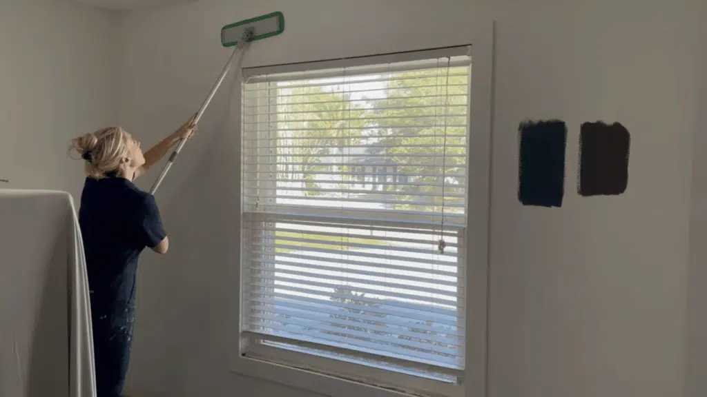 cleaning walls thoroughly to remove dust dirt and grease using cleaner