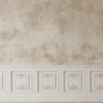 decorative wall with classic wainscoting panels and textured beige finish, creating an elegant and timeless interior backdrop