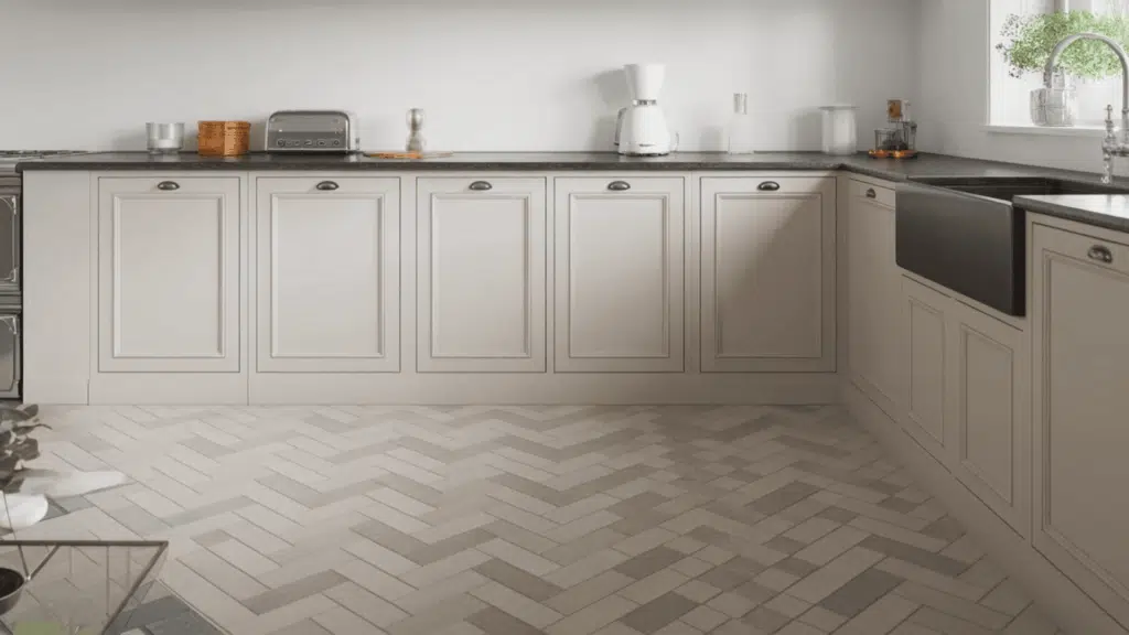 herringbone tile floor and backsplash in a modern kitchen with white cabinets showing the pattern used in a high traffic practical space