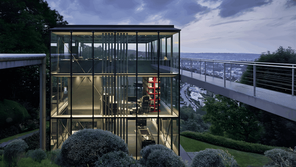 modern glass house in a hillside landscape with panoramic city views, featuring a multi-level transparent structure and surrounding greenery