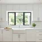 modern white kitchen with clean cabinets.