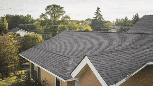 residential home roof showing roof pitch angle with asphalt shingles illustrating common standard roof pitch used in home construction