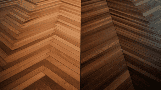 side by side floor comparison showing herringbone pattern on the left and chevron pattern on the right in warm wood tones
