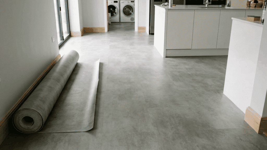smooth sheet vinyl flooring installed in a modern kitchen space.