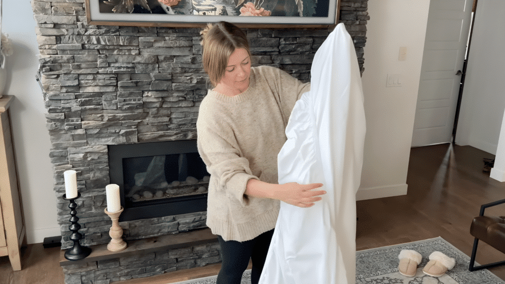 tucking remaining two corners into pocket so all four corners are stacked together neatly