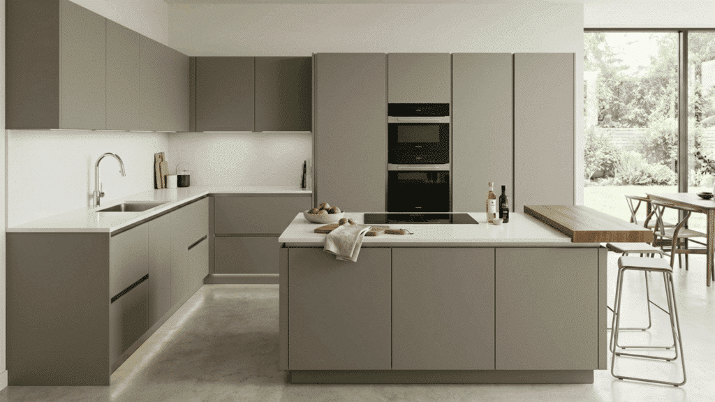 Handleless modular kitchen, flat panel cabinets, seamless design, modern minimal style, clean look