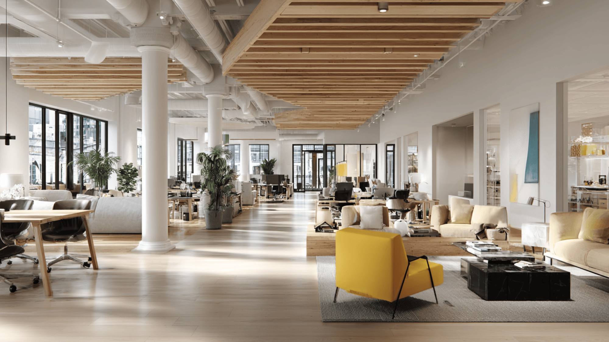 a co working space with shared desks and collaborative areas designed for flexibility and creativity