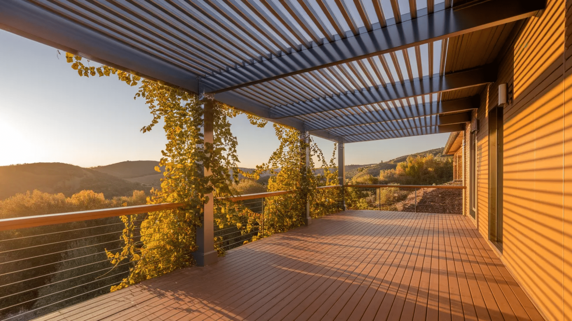 a modern pergola with slatted metal roofing, perfect for outdoor relaxation, providing partial shade and beautiful scenic views.