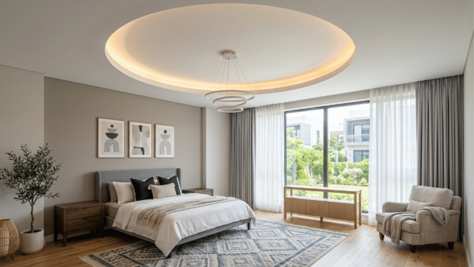 a modern room with a circular recessed tray ceiling creating a soft and balanced ceiling shape