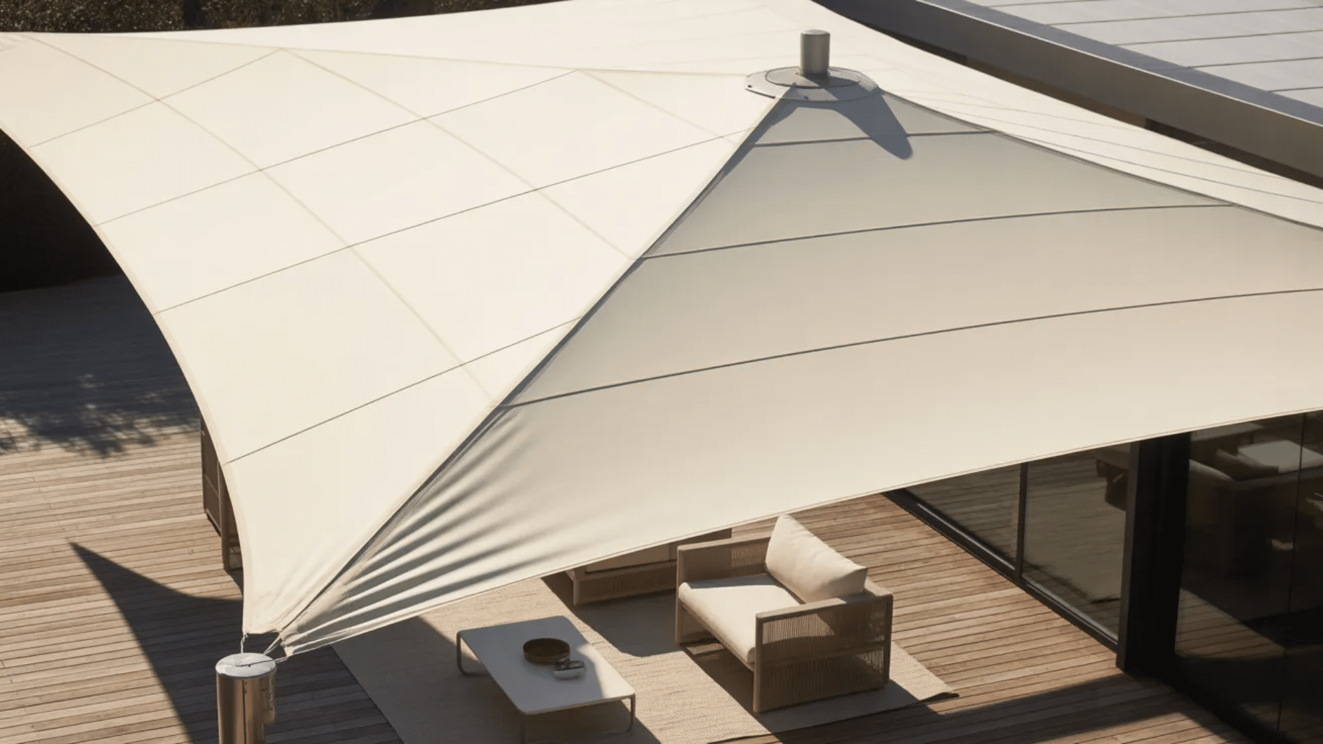 a sleek, modern outdoor shade canopy providing both shade and style over a comfortable seating area.