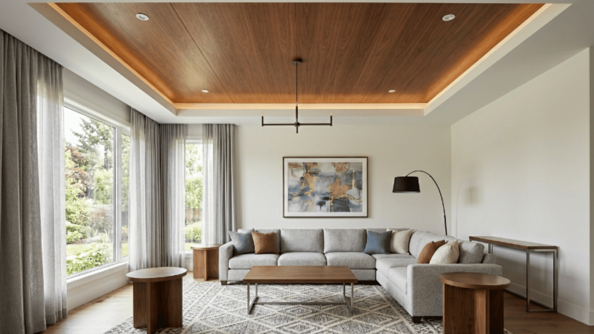 a tray ceiling covered with smooth wood veneer panels giving a clean and rich finish