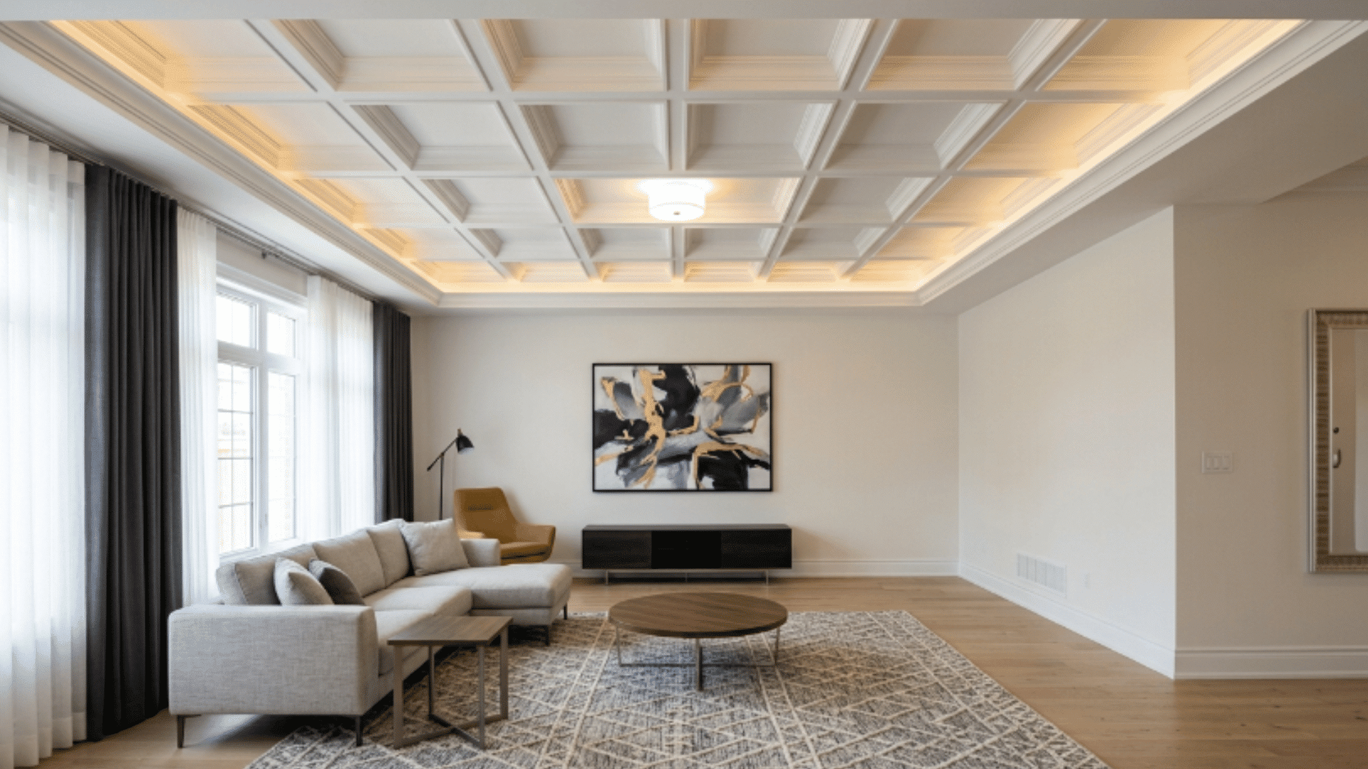 a tray ceiling divided into even sections with molding forming a grid pattern across the ceiling