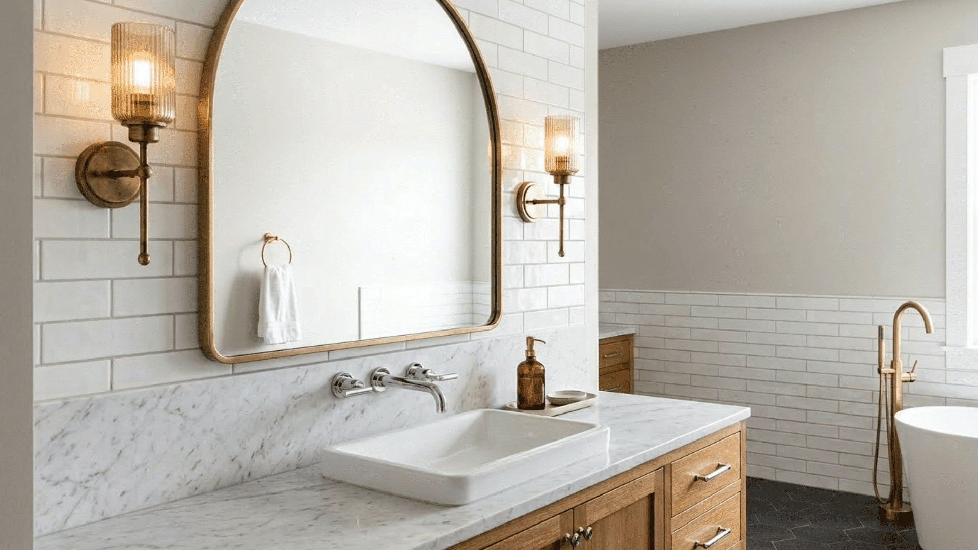 bathroom with mixed metal fixtures adding depth and contrast.