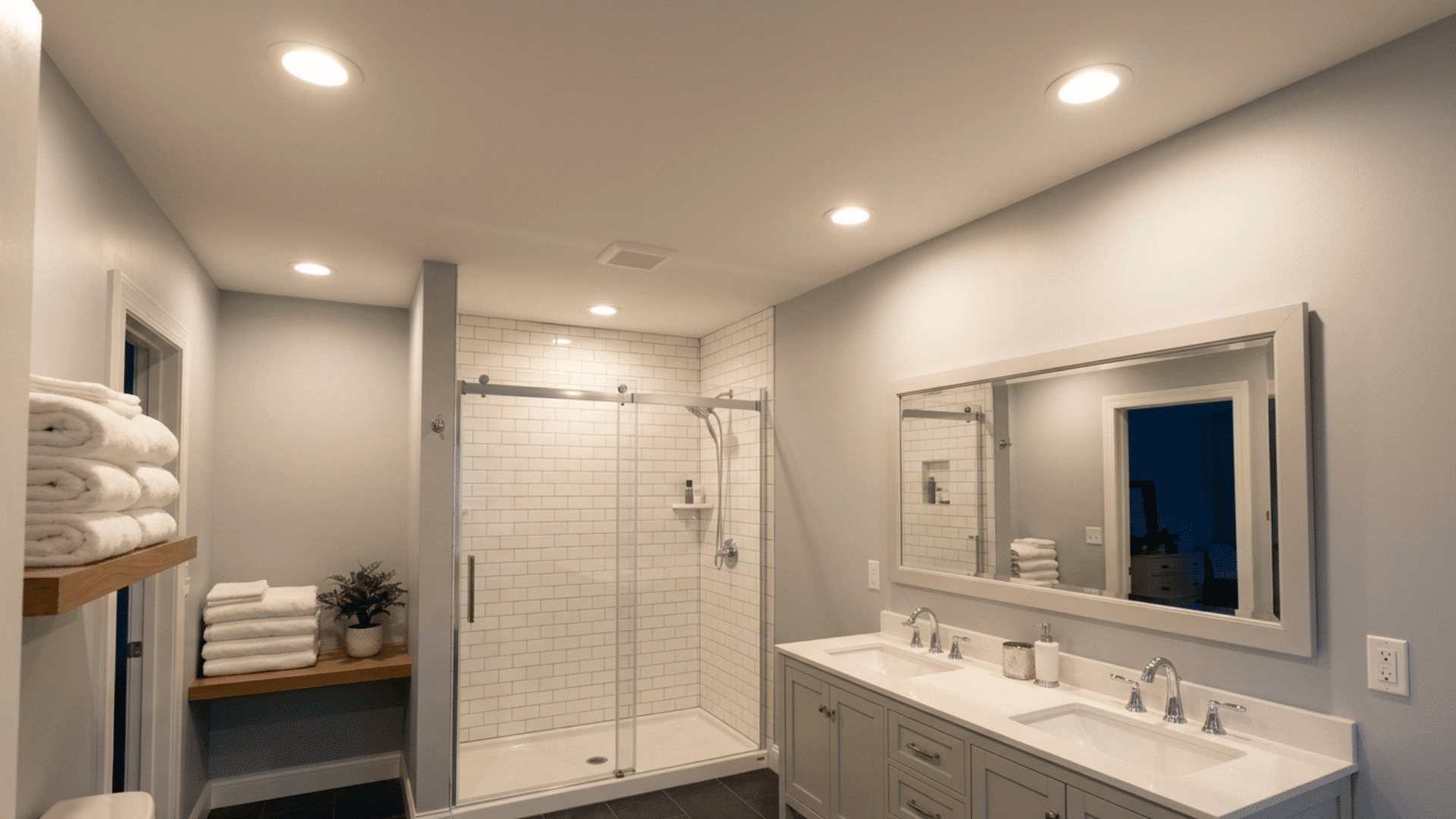 bathroom with recessed ceiling lights for clean and even illumination.