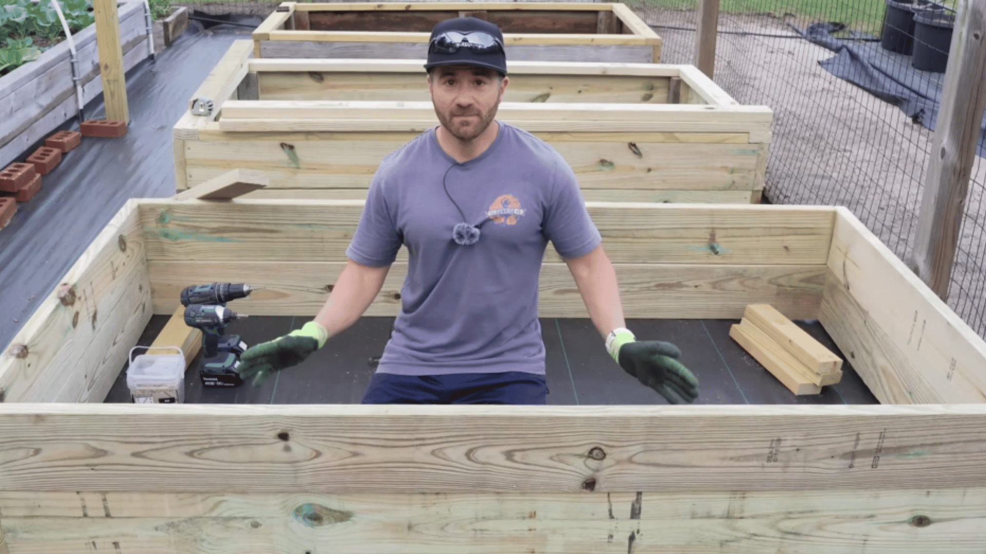 building second identical frame layer with aligned wooden boards