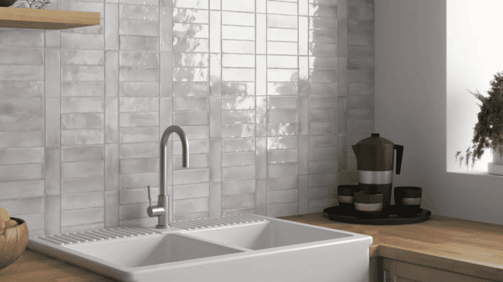 combines horizontal and vertical subway tiles to creates a unique and modern layout in this classy kitchen.