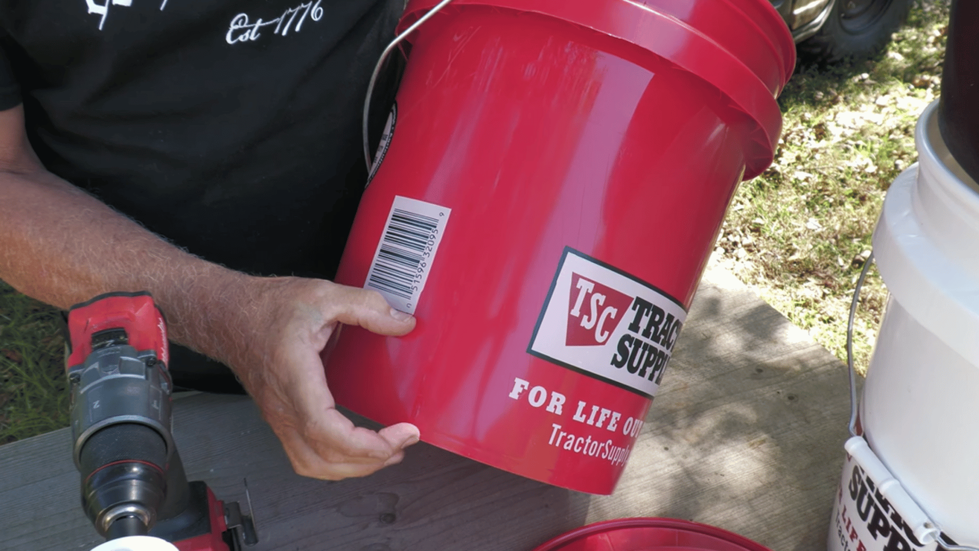estimate evenly spaced circles near the bottom of a 5-gallon bucket