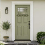 front entry door centered on a clean home exterior with neutral wall white trim and soft natural daylight setting