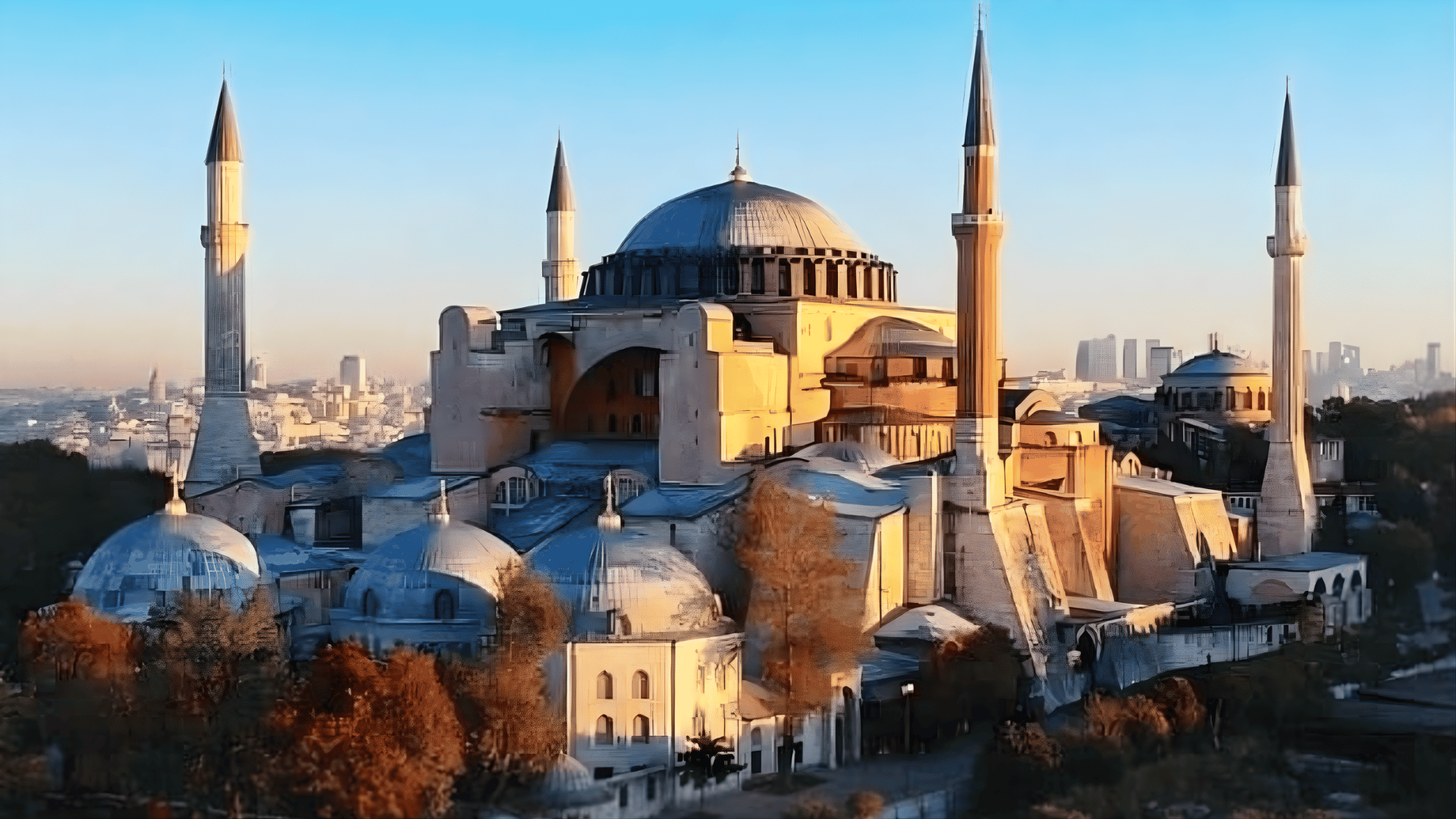 hagia Sophia with large dome and minarets, blending Byzantine and Islamic influences in european architecture history. (3)