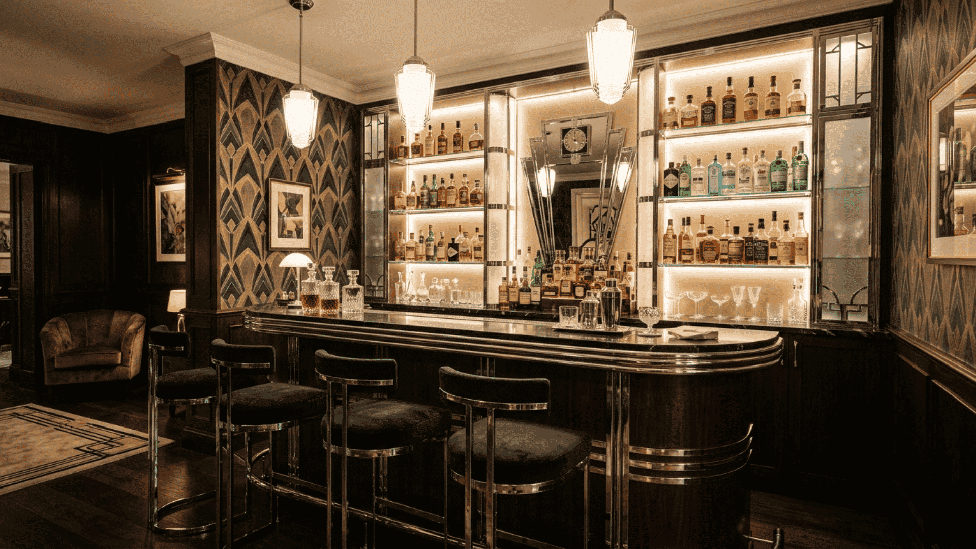 home bar with chrome accents and glass shelves in clean art deco interior design setting