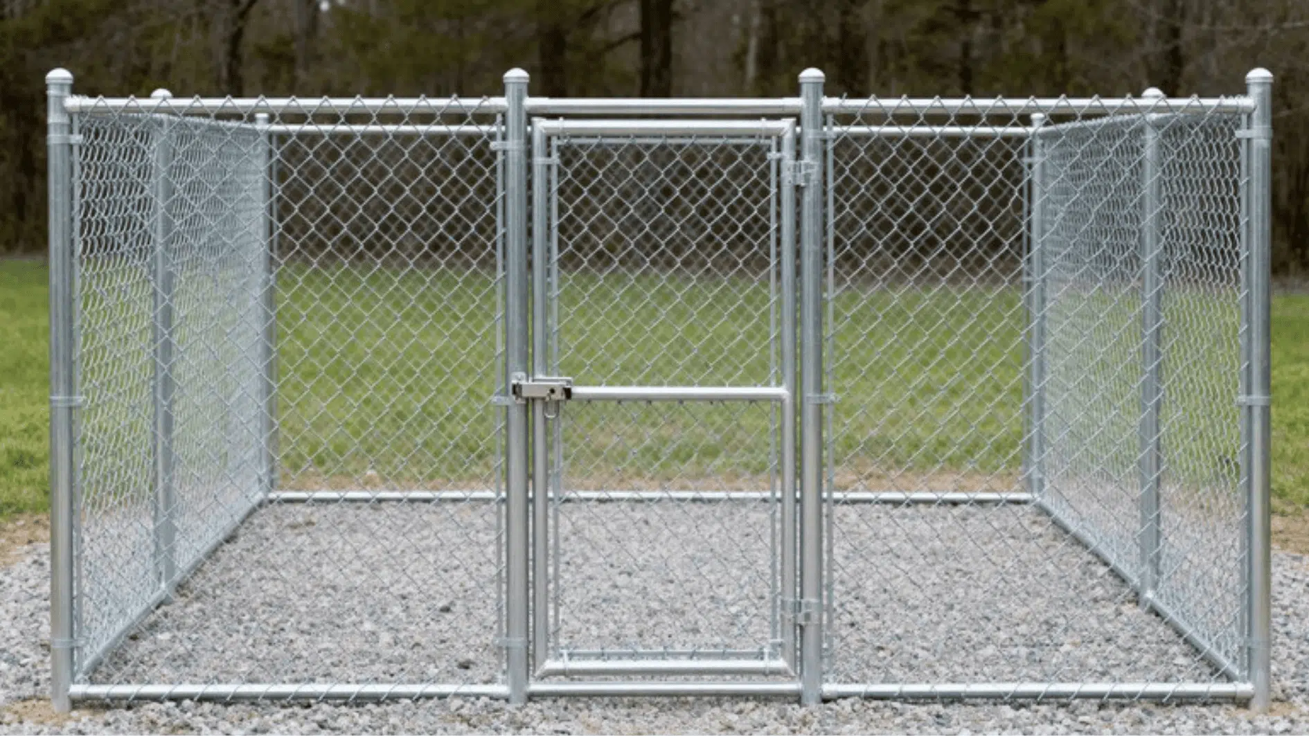 metal chain link dog kennel enclosure with secure gate in outdoor yard, sturdy fencing structure on gravel base