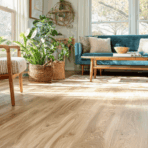 mid century modern living room with light wood flooring indoor plants natural light and simple furniture
