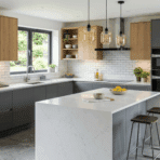 modern modular kitchen with grey and wood cabinets, island seating, pendant lights and bright natural lighting