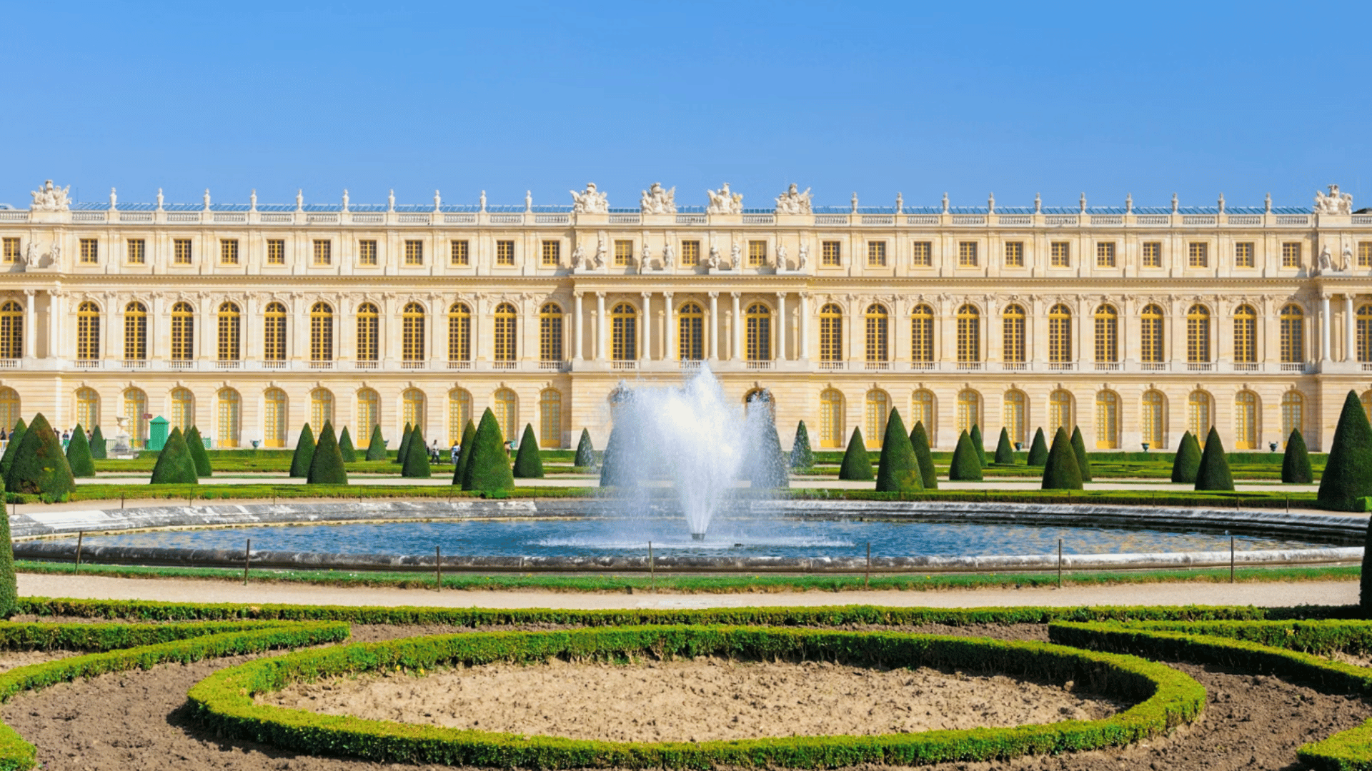 palace of Versailles with detailed façade and symmetry, representing Baroque european architecture and royal design. (1)