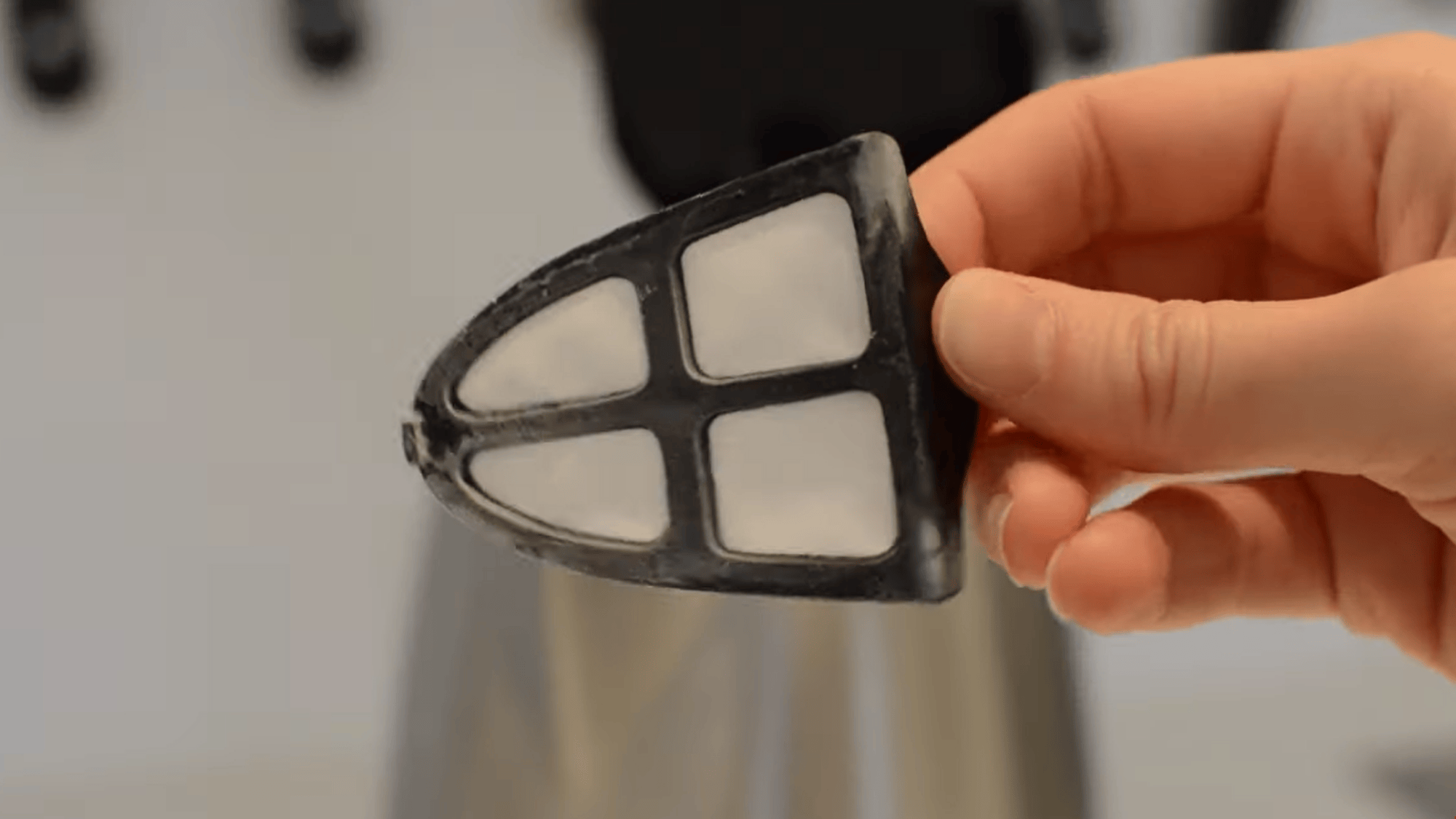 remove and soak kettle filter in vinegar solution