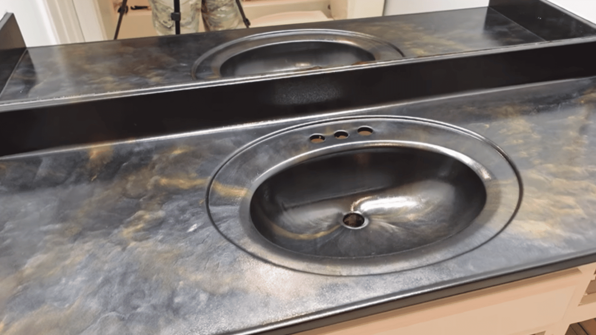 remove tape carefully and allow vanity to cure before reinstalling fixtures