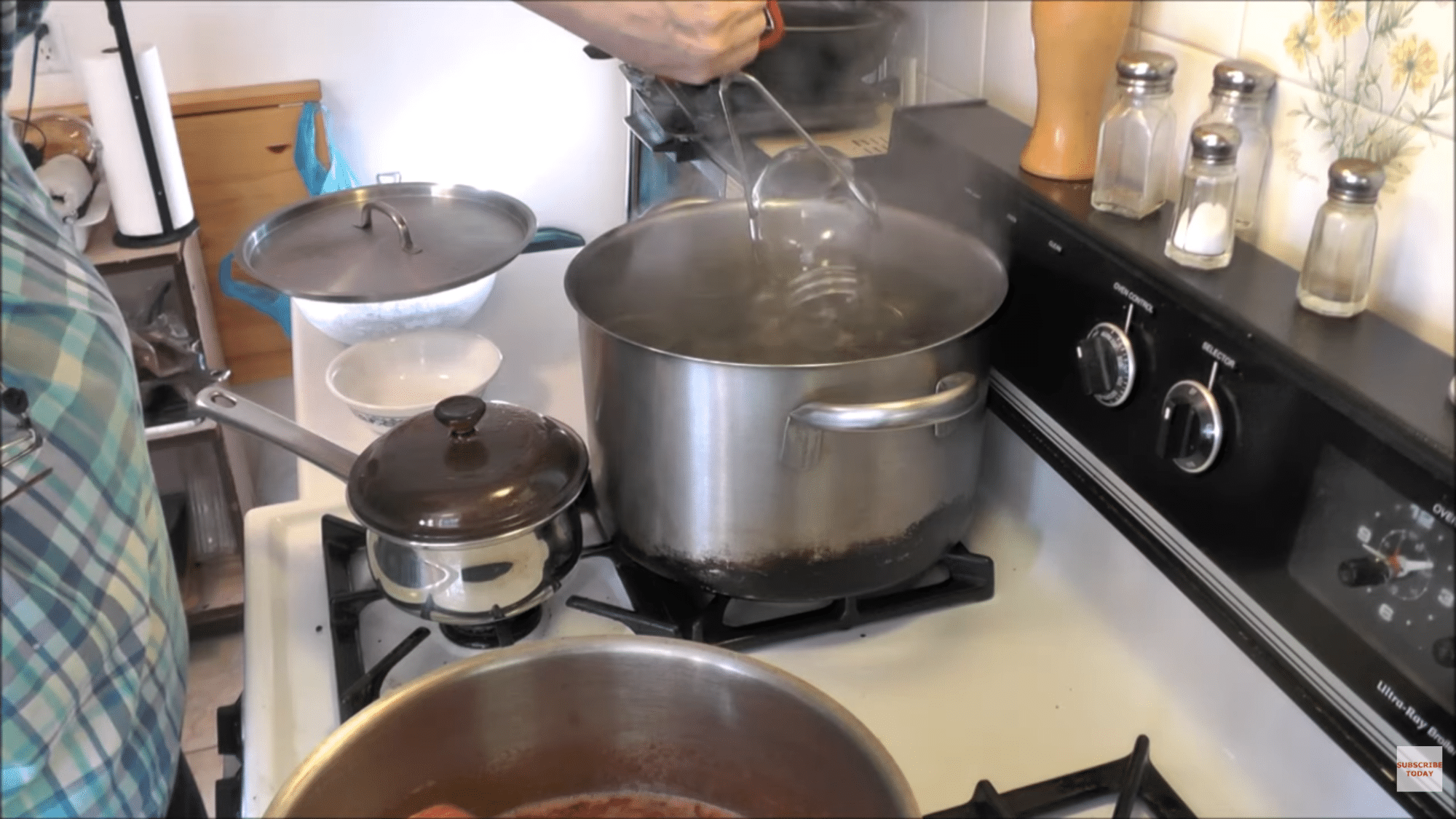 removing hot jars with tongs