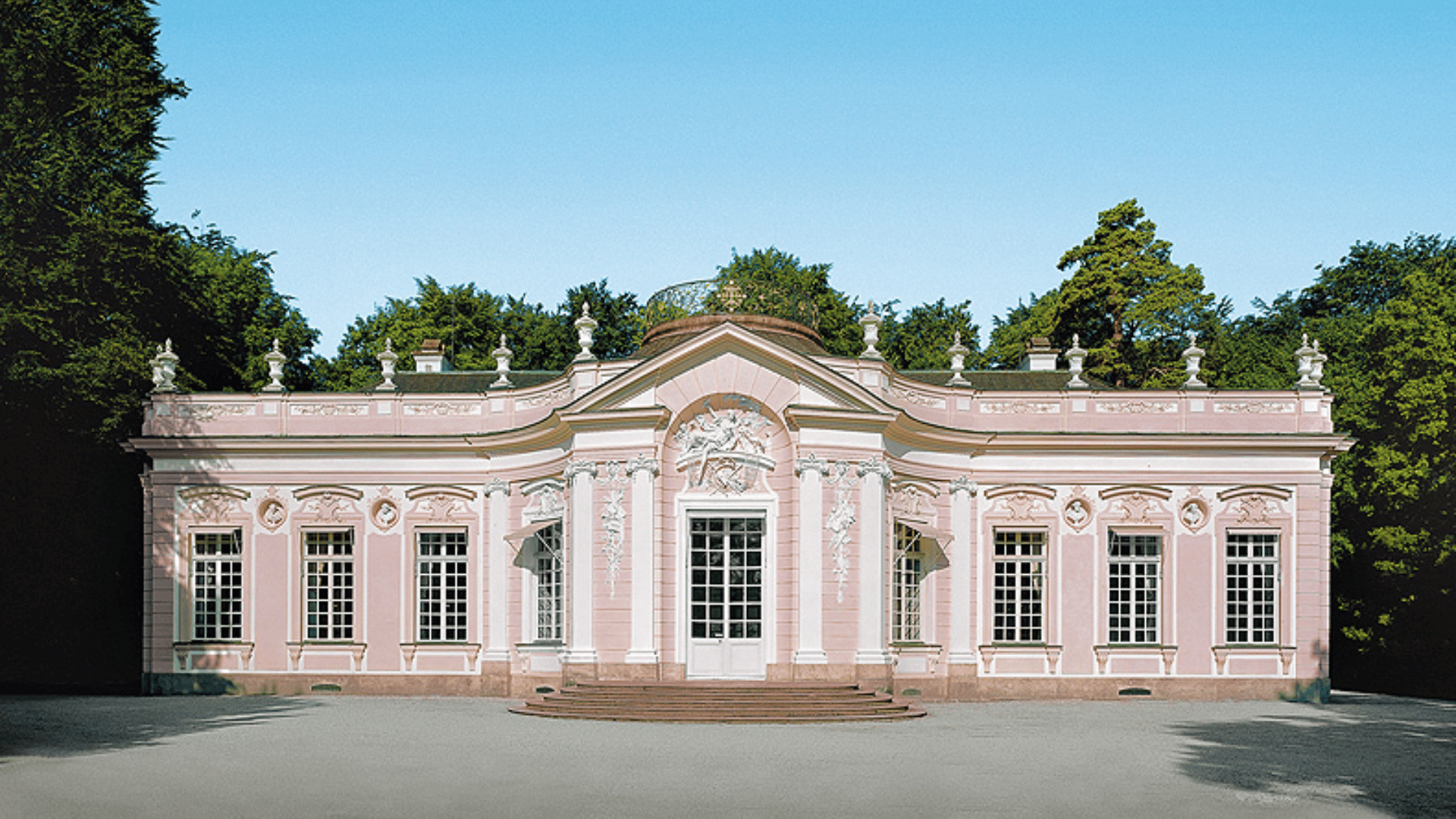 rococo-style palace with soft colors and curved details, showing decorative interior-focused european architecture style. (1)