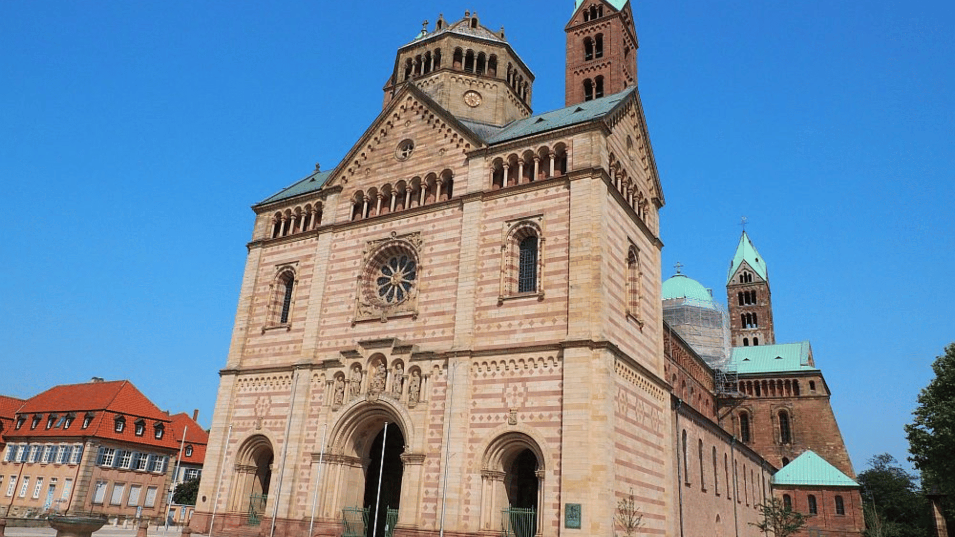 romanesque cathedral with thick walls, rounded arches, and solid structure, showing early medieval european architecture style. (1) (1)
