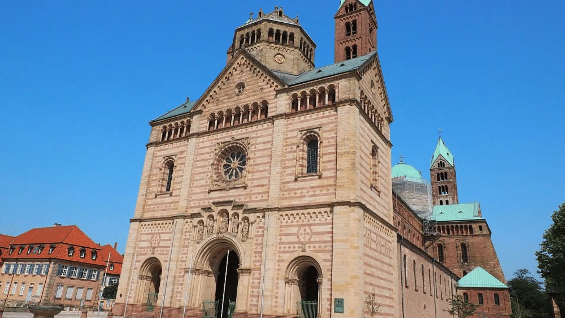 romanesque cathedral with thick walls, rounded arches, and solid structure, showing early medieval european architecture style. (1) (1)
