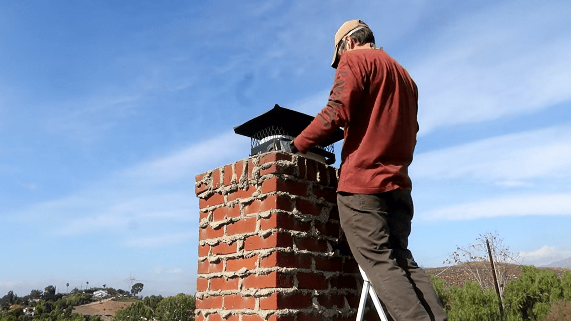 scrub chimney liner to remove soot and creosote buildup