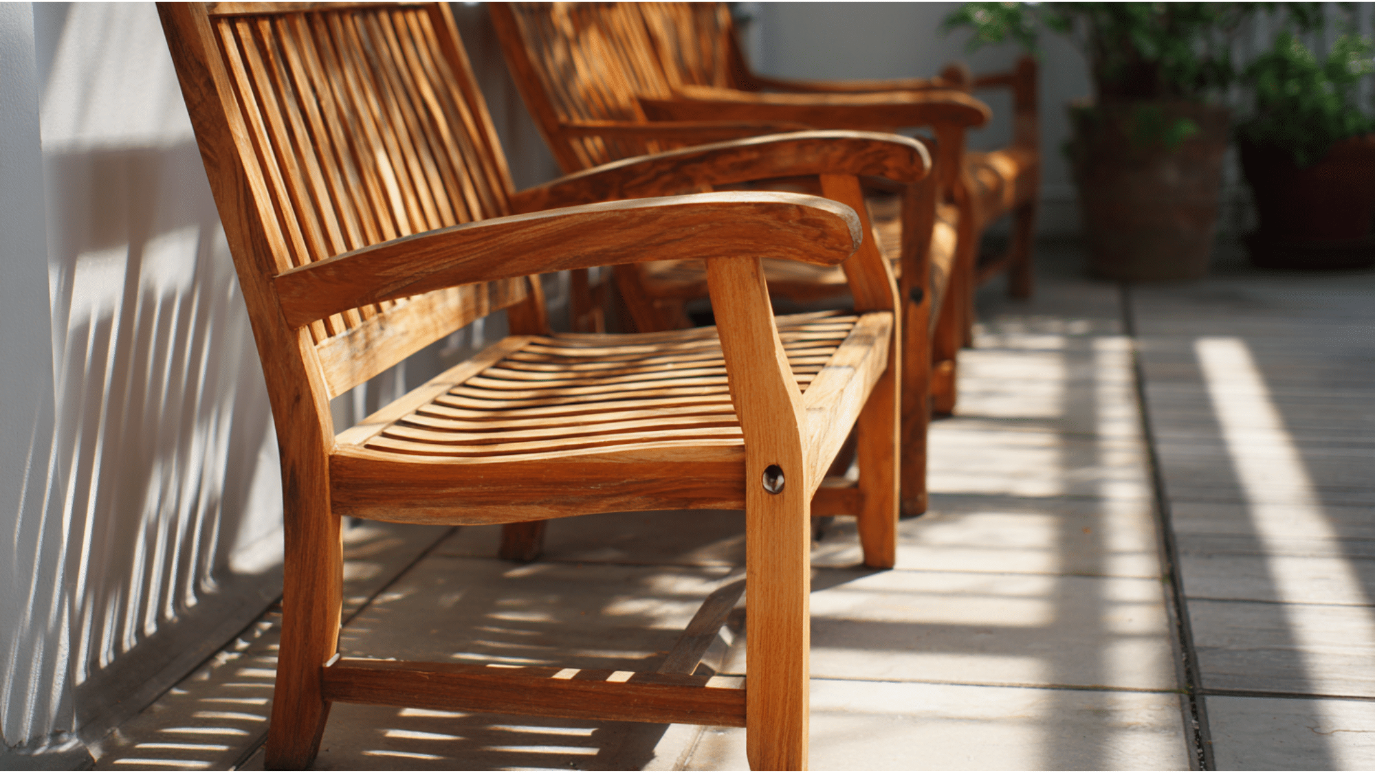 teak wood furniture air drying in a shaded and well ventilated area after cleaning