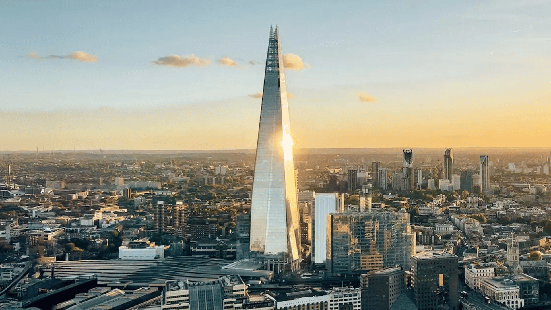 the Shard skyscraper in London with glass façade, representing modern european architecture and urban development. (1)