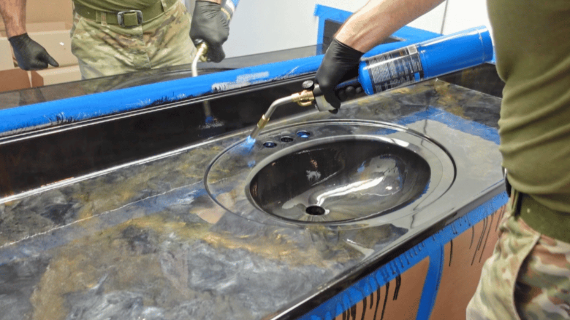 use heat gun to remove bubbles and smooth out epoxy surface