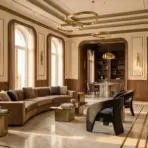 Luxurious living room with arched windows, beige sofas, gold accents, and marble floors in warm lighting