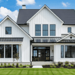 board and batten siding on modern farmhouse with white panels and black trim clean exterior design style