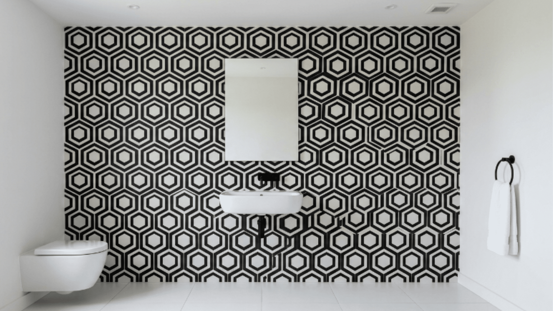 geometric wall tile guest bathroom with bold pattern clean minimal decor front view