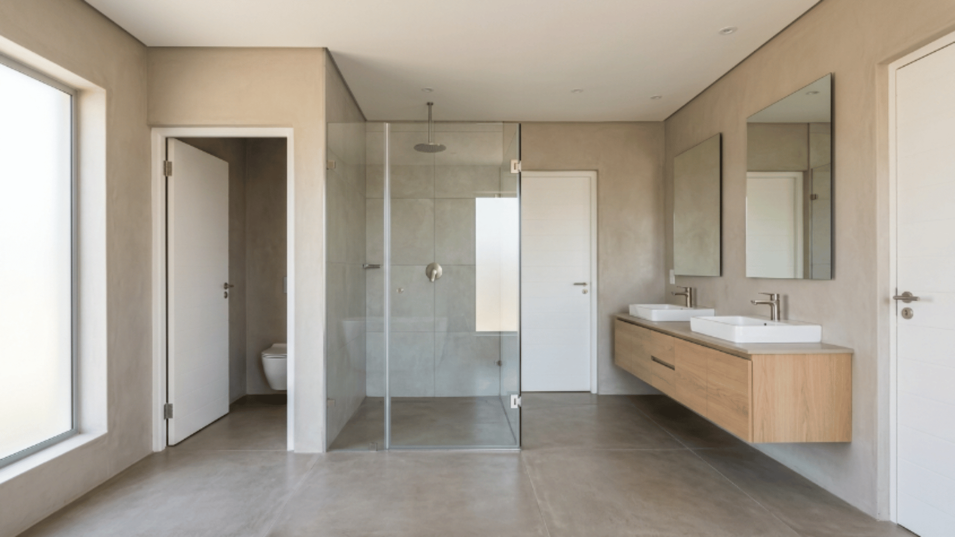 jack and jill bathroom with shower placed off center creating uneven zones (1)