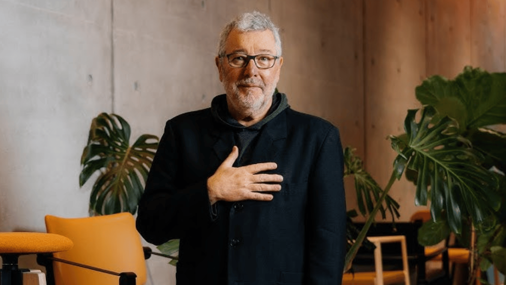 philippe starck in a minimal setting highlighting his modern and creative approach to interior design (1)